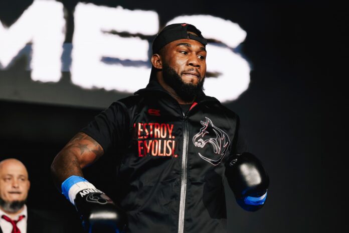 Carlos Adames makes his ring walk ahead of his boxing match against Austin Williams