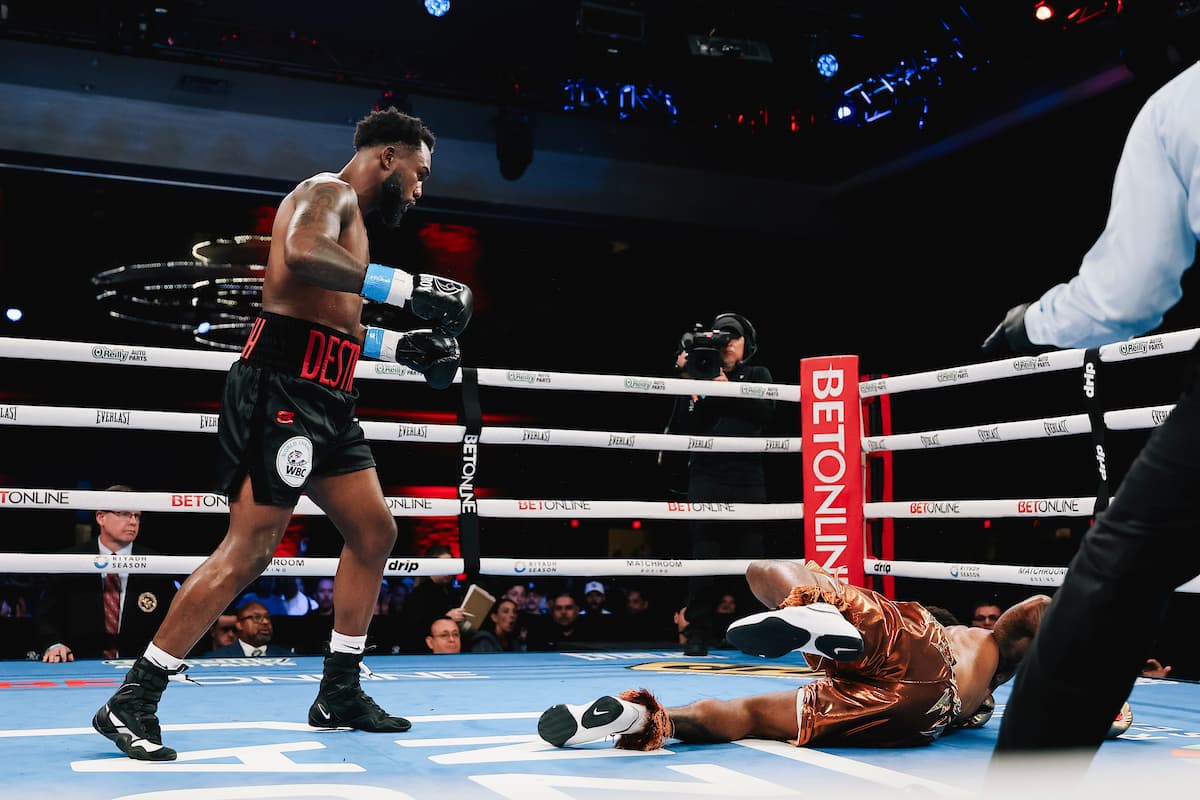 Carlos Adames knocks down Austin Williams during their bout