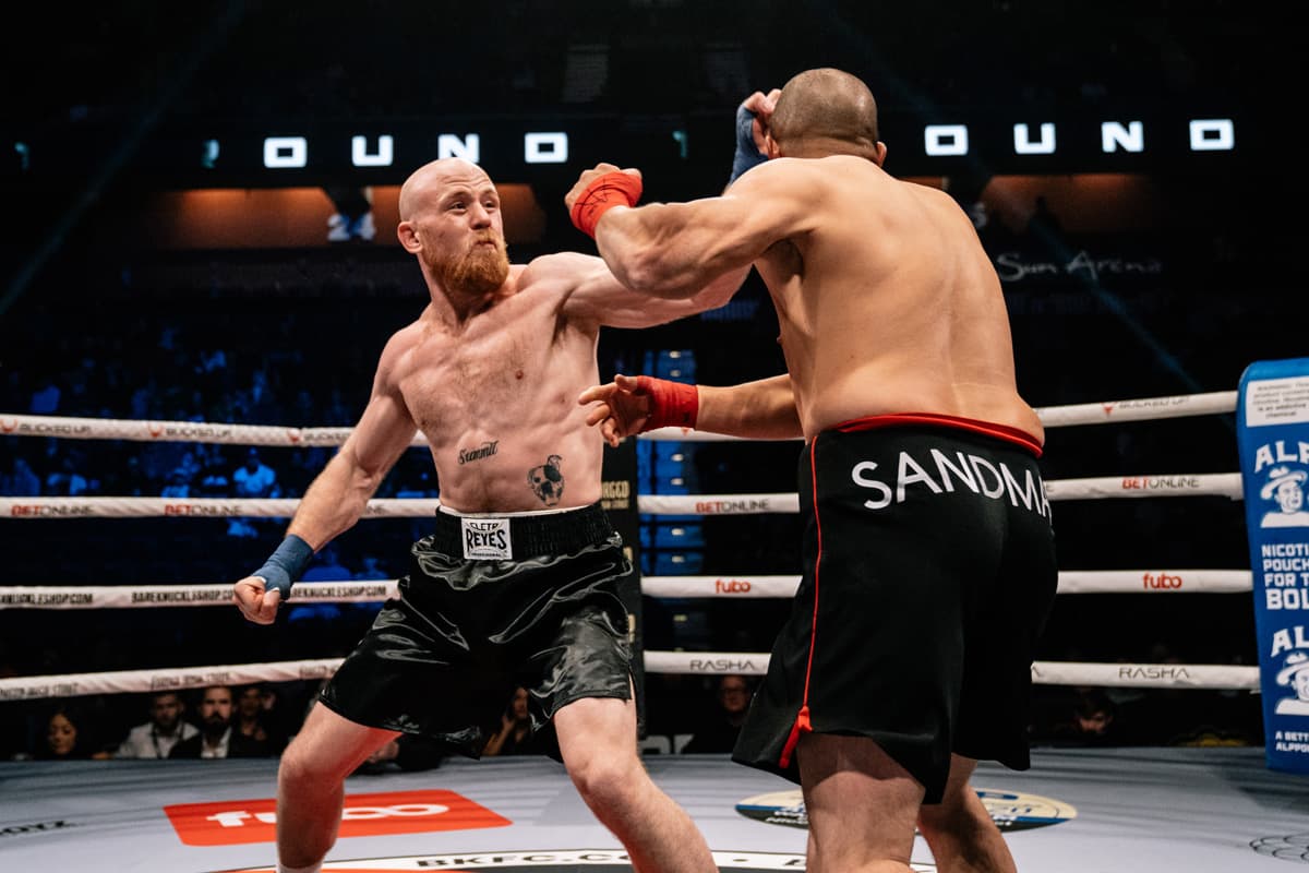 David Burke lands a punch during his bout against David Sanchez