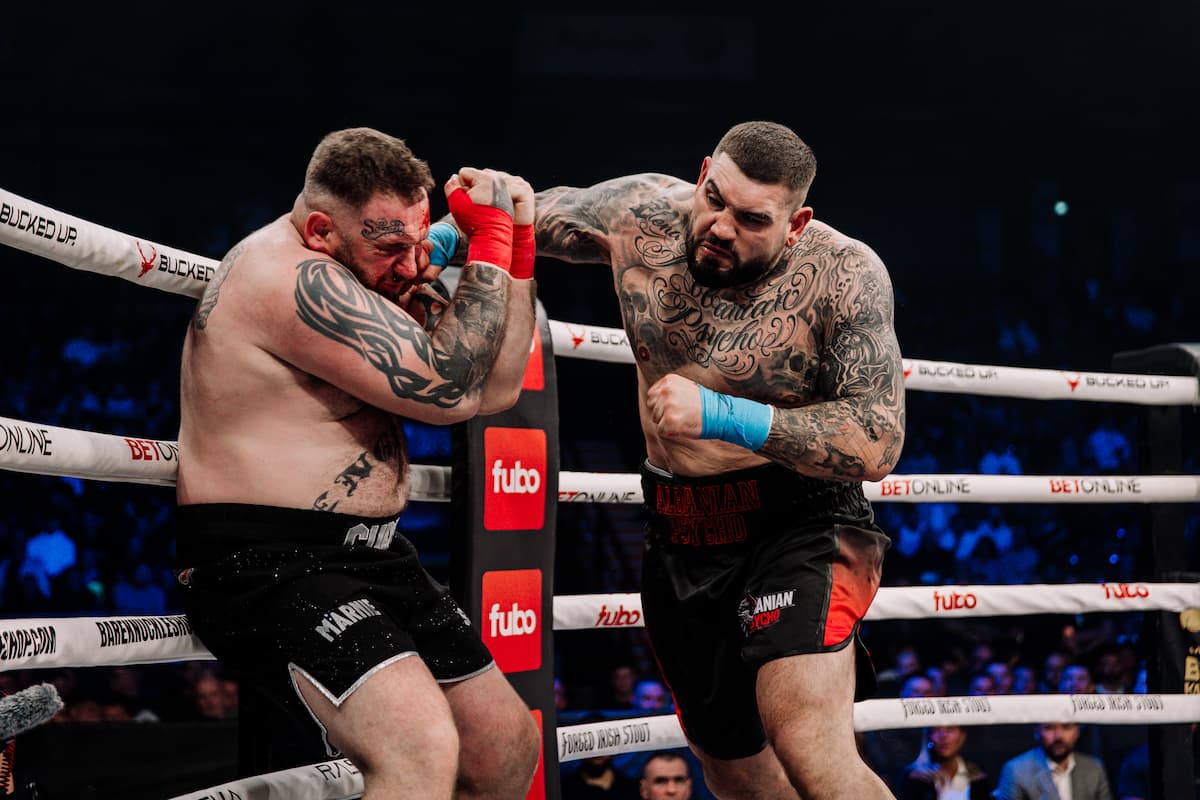Gzim Selmani lands a punch during his bout against Daniel Curtin