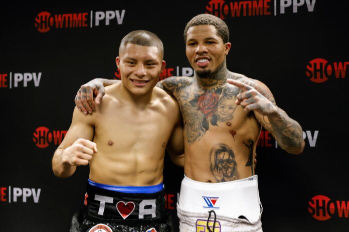 Isaac 'Pitbul' Cruz and Gervonta 'Tank' Davis posing backstage after their boxing match