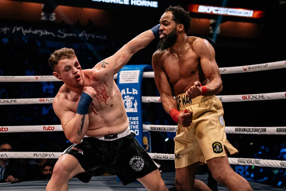 Joseph Peters lands a punch during his bout against Maurice Horne
