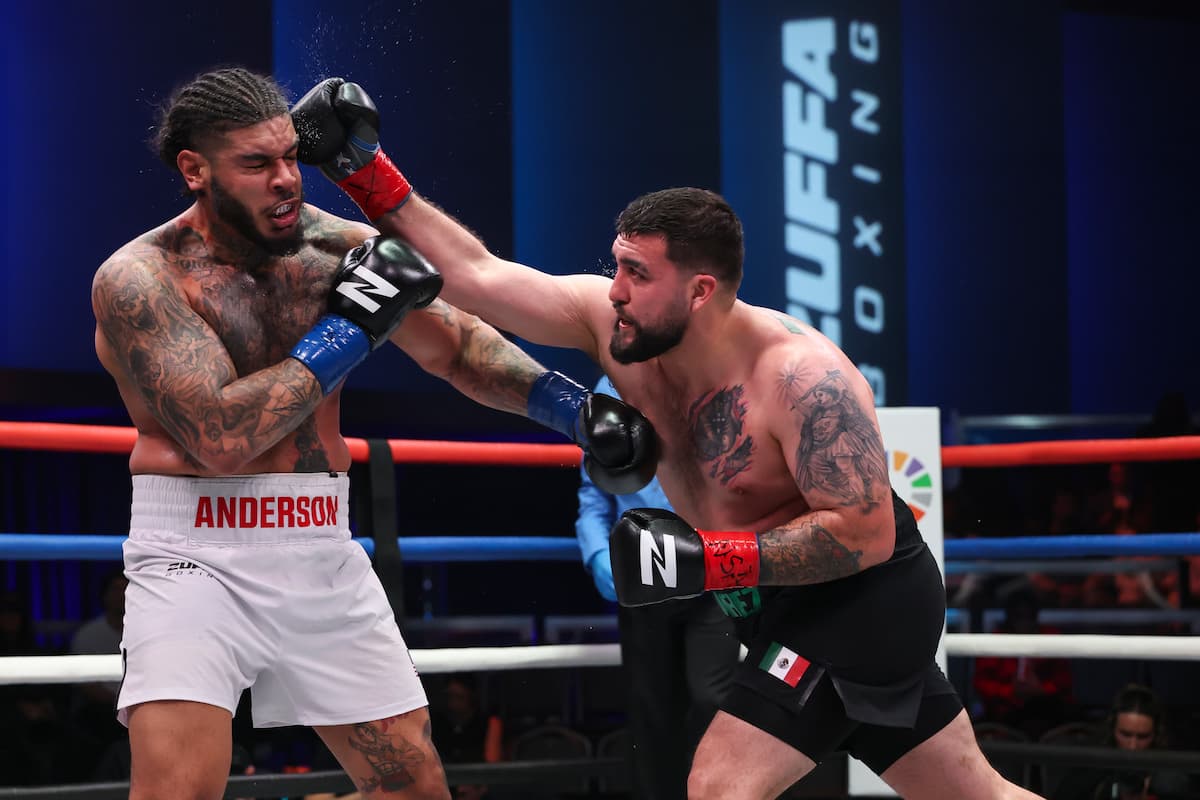 Joshua Juarez lands a punch during his boxing match against Jardae Anderson