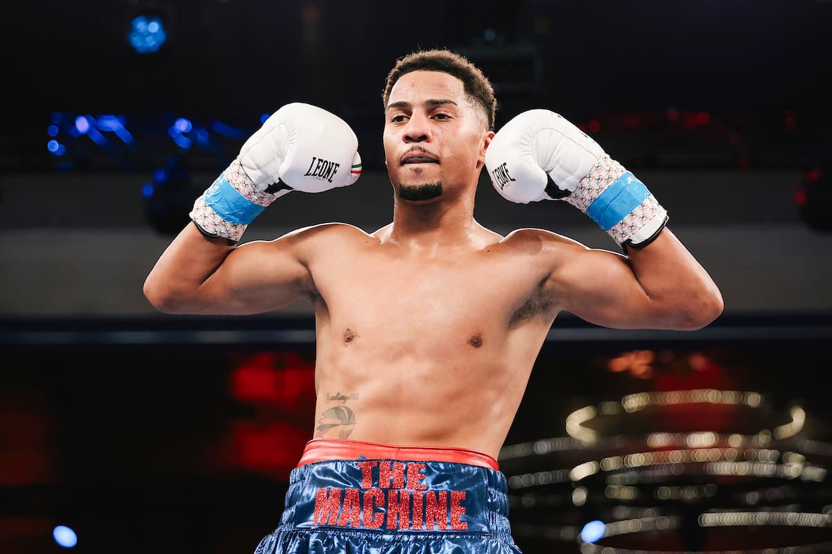 Junior Alcantara celebrates his victory over Israel Camacho during their boxing match