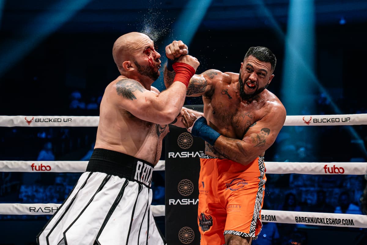 Nicholas "Chino" Blume throws a punch during his bout against Alex Davis