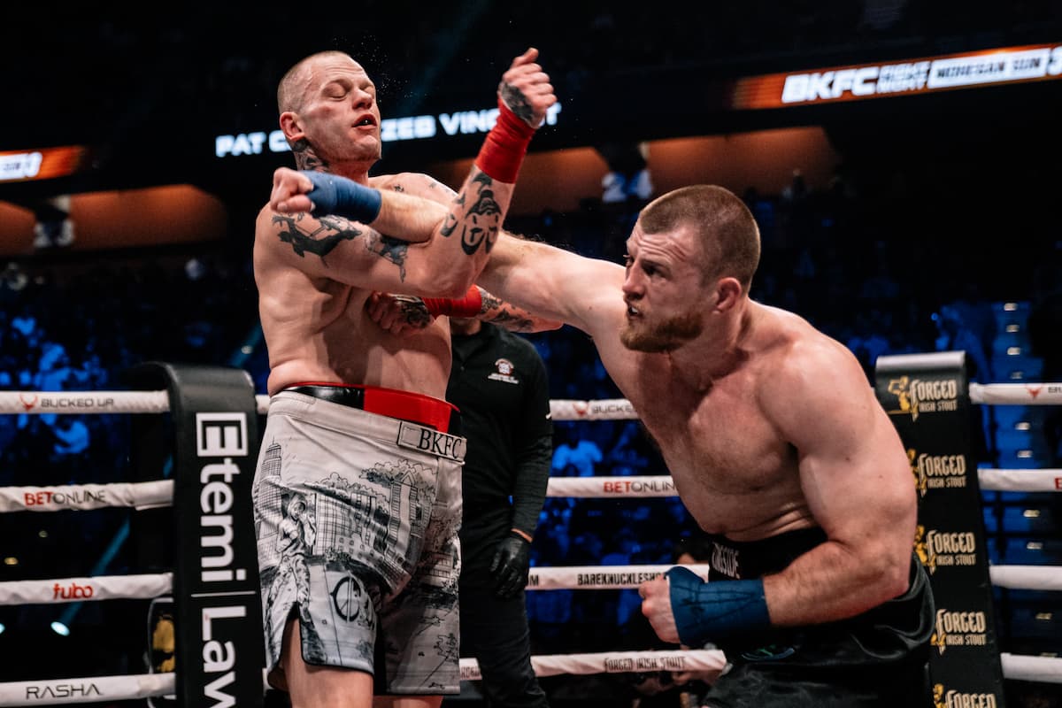 Pat Casey throws a punch during his bout against Zeb Vincent