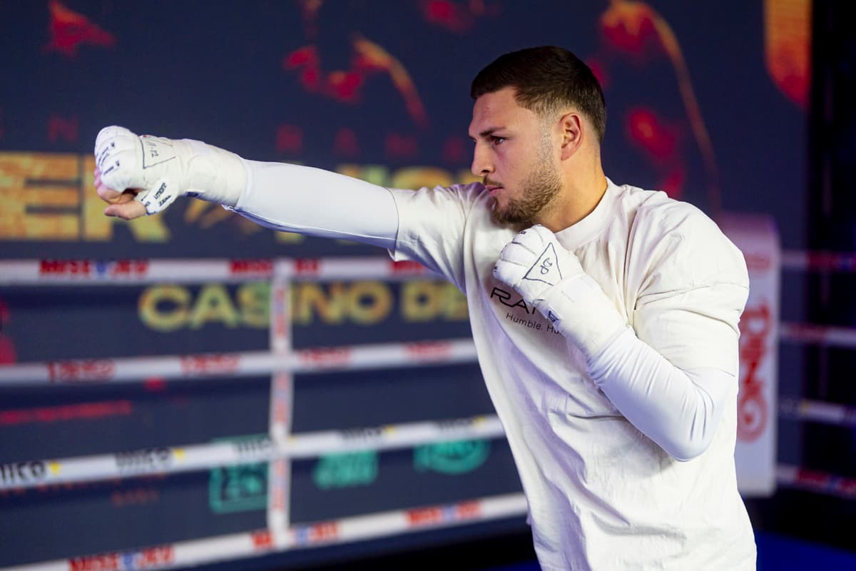 Ramadan Hiseni shadowboxing during an open workout