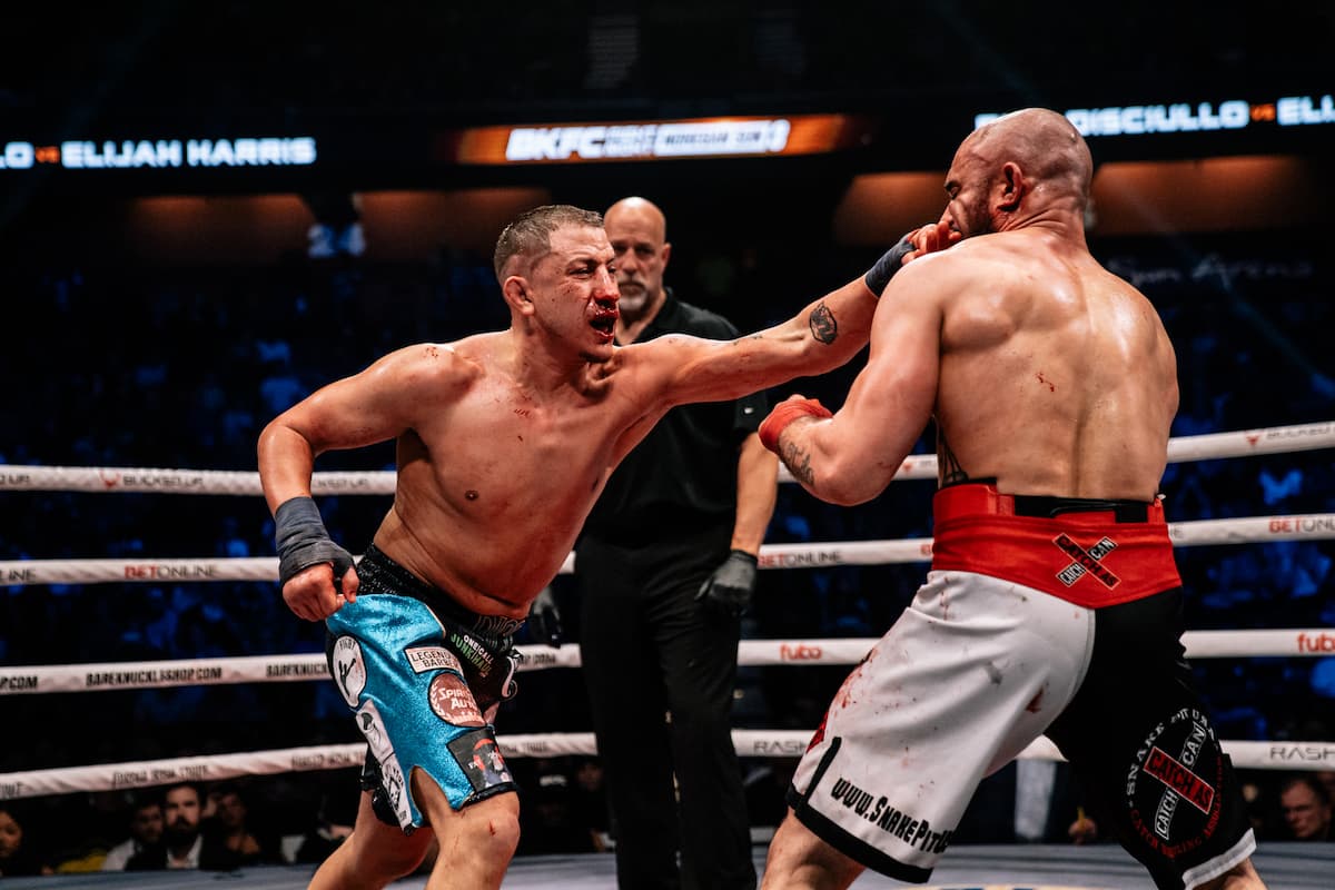 Rico Disciullo lands a punch during his bout against Elijah Harris