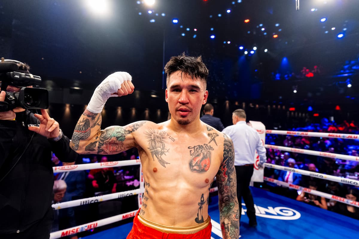 Steve Claggett posing in the ring following his victory in a boxing match against Alejandro Frias Rodriguez