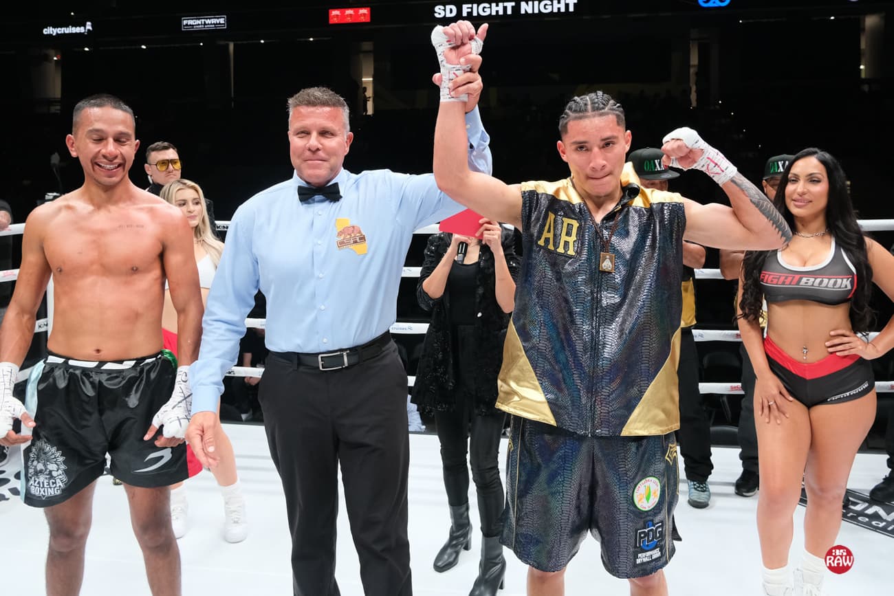 Referee Tom Taylor raises Angel Ramirez's hand in victory over Jose Antonio Sosa Reyna