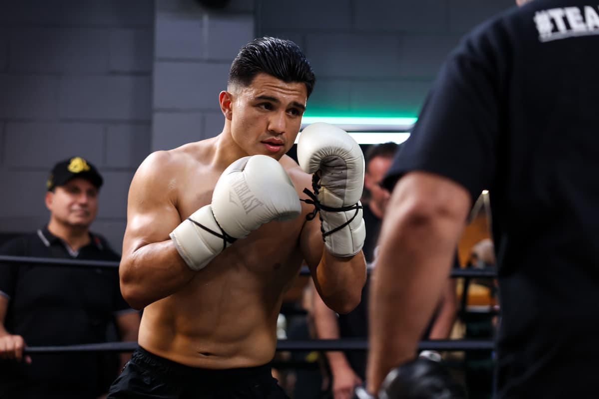 Armando Resendiz works the mitts during a media workout