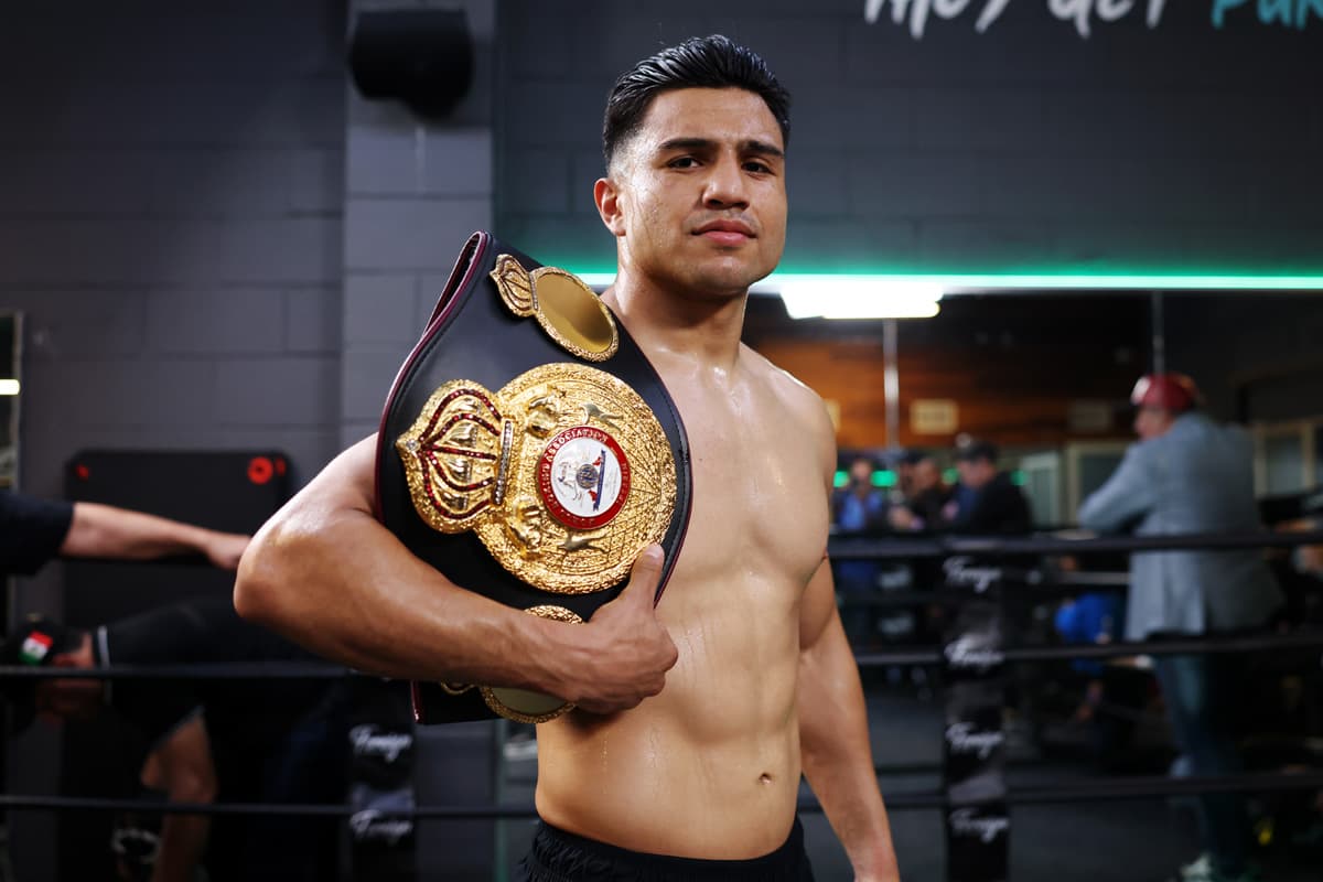 Armando Resendiz poses with the WBA belt during a media workout