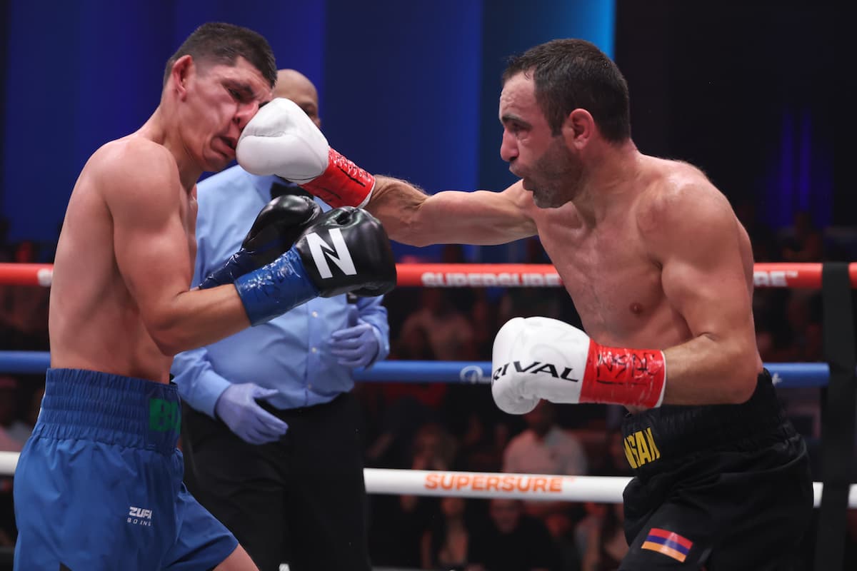 Azat Hovhannisyan lands a punch during his boxing match against Eduardo Baez