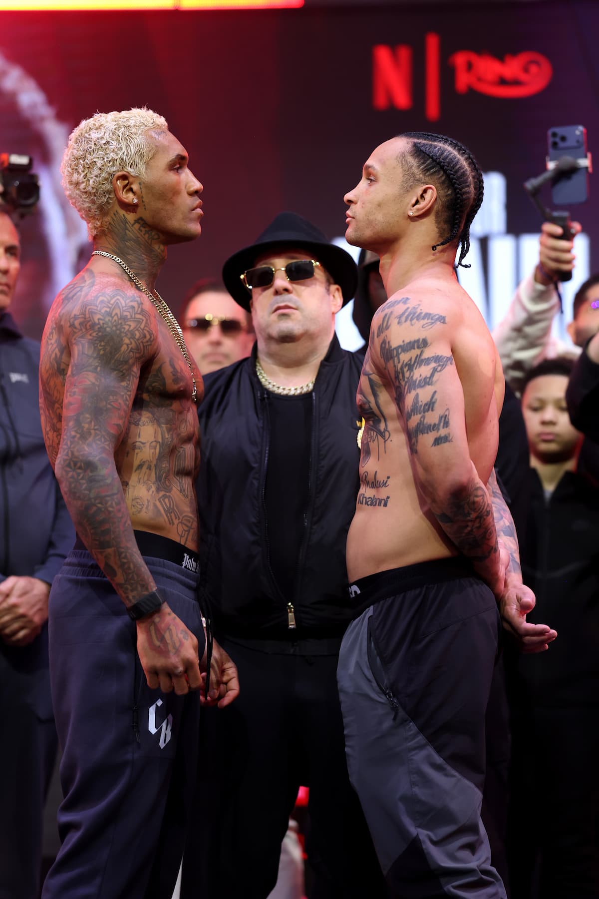 Conor Benn and Regis Prograis faceoff at the weigh-in ahead of their boxing match in London