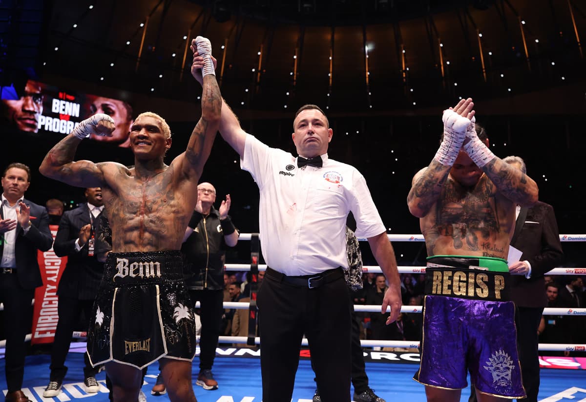 The referee raises Conor Benn's hand after his victory over Regis Prograis