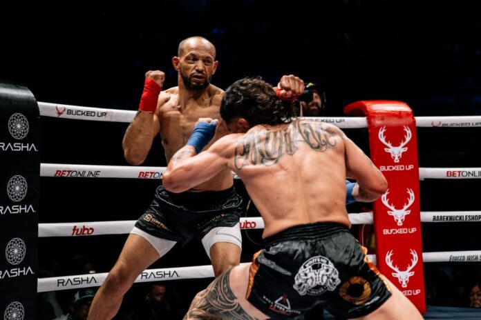 Doug Coltrane throws a punch during his bout against Maki Pitolo at BKFC Honolulu