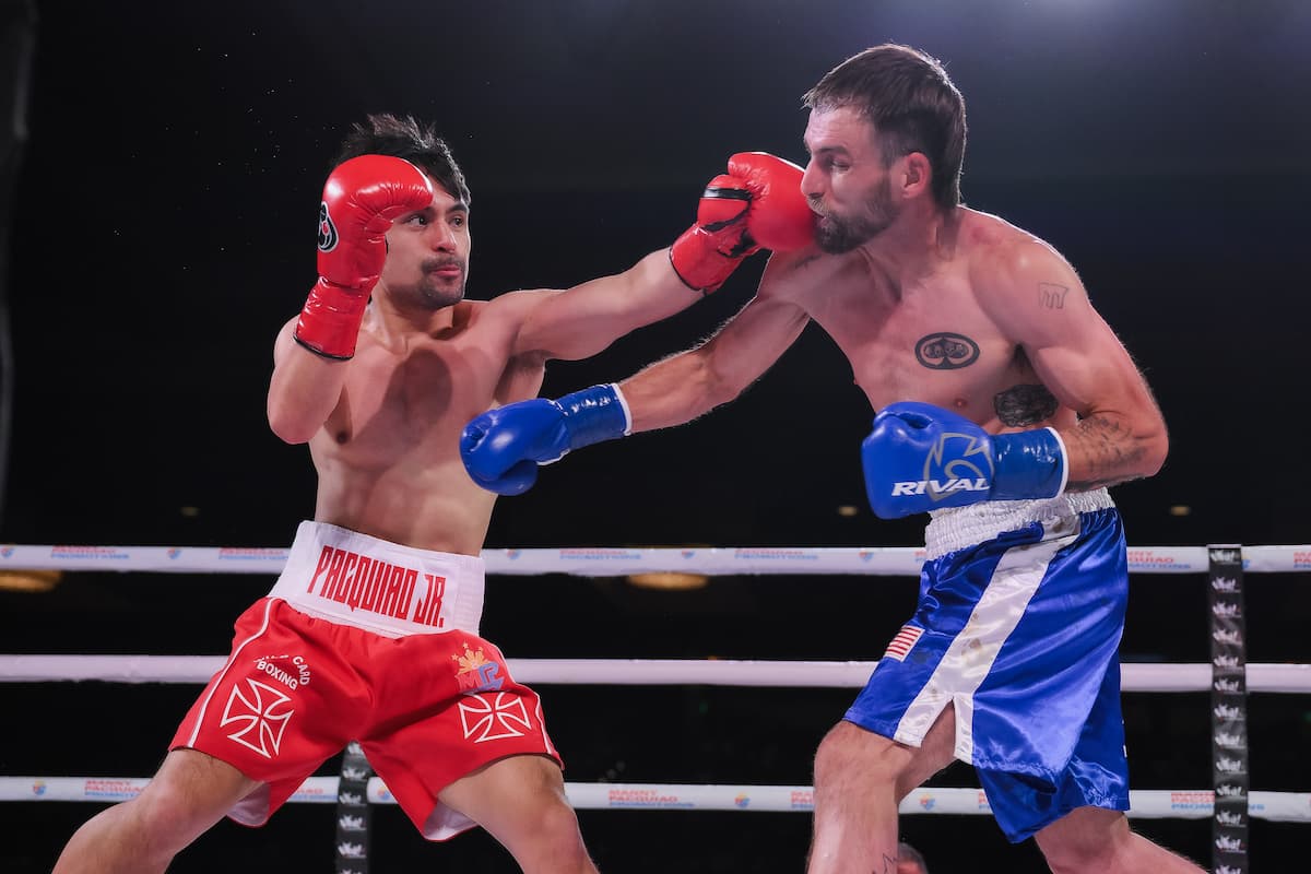 Emmanuel Pacquiao Jr lands a jab during his boxing match against Darrick Gates