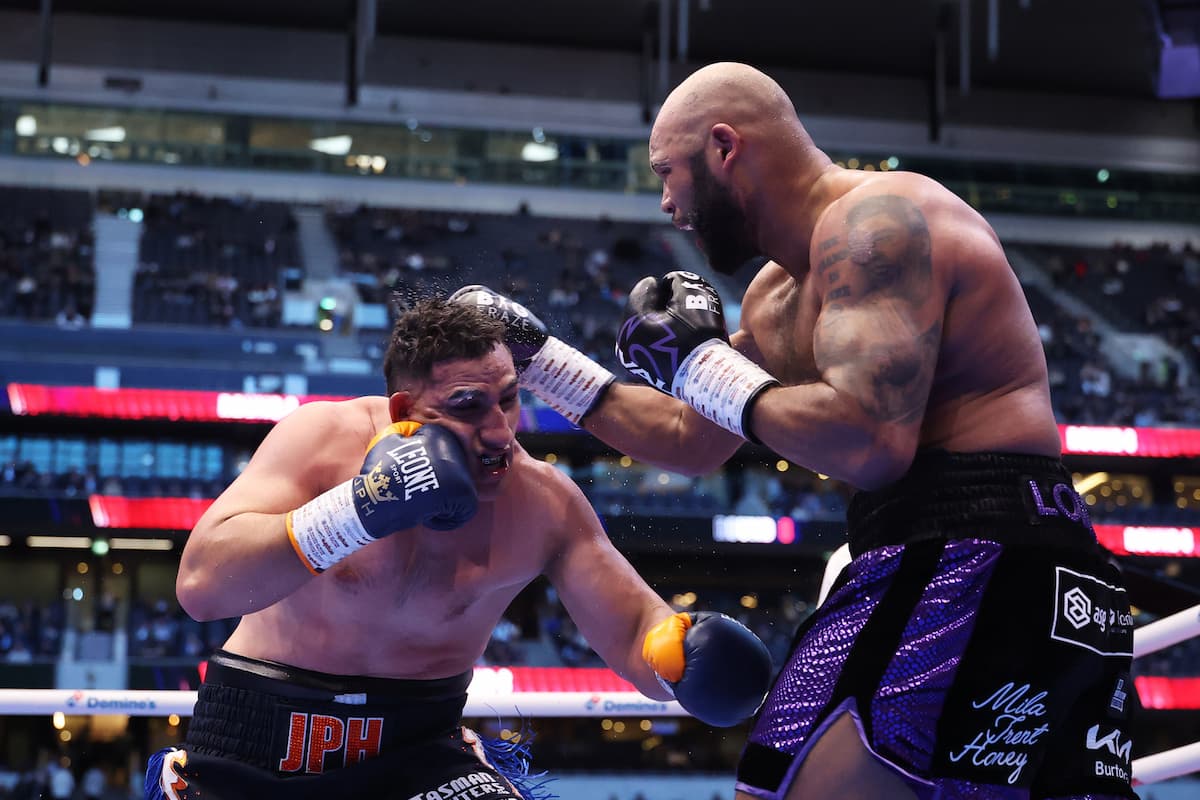 Frazer Clarke lands a hook during his fight against Justis Huni