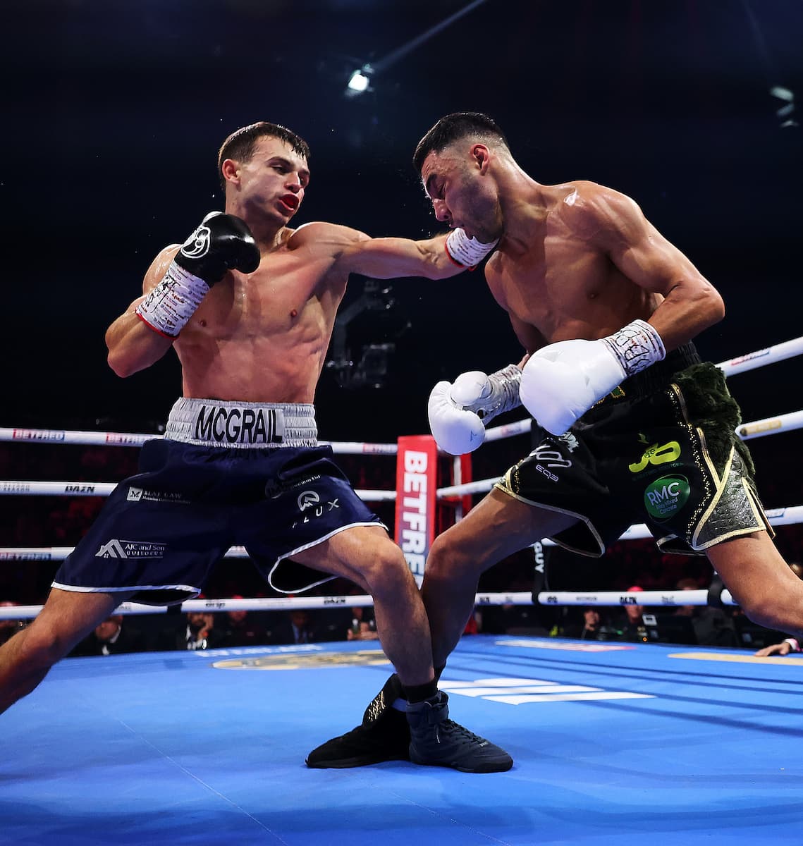Joe McGrail and Aaron Hayden during their super bantamweight bout
