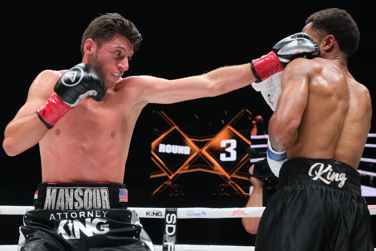 Jonny Mansour lands a jab during his bout against William King