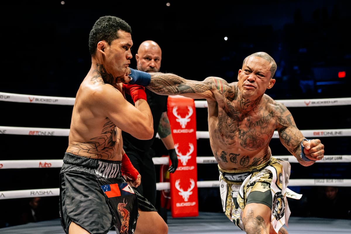 Joseph Calarruda throws a punch during his bout against Fatu Tuitasi