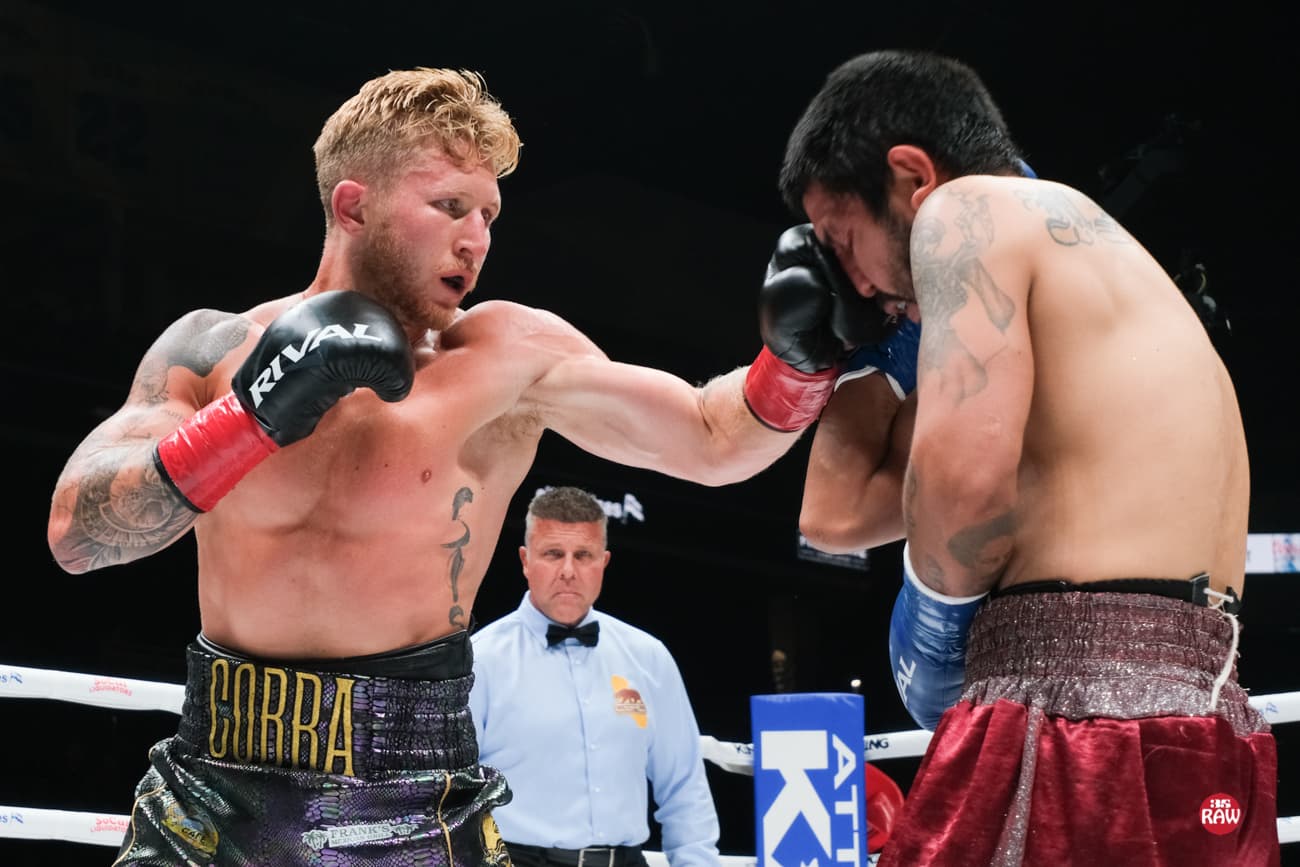 Kyle Erwin lands a punch during his bout against Jose Marrufo