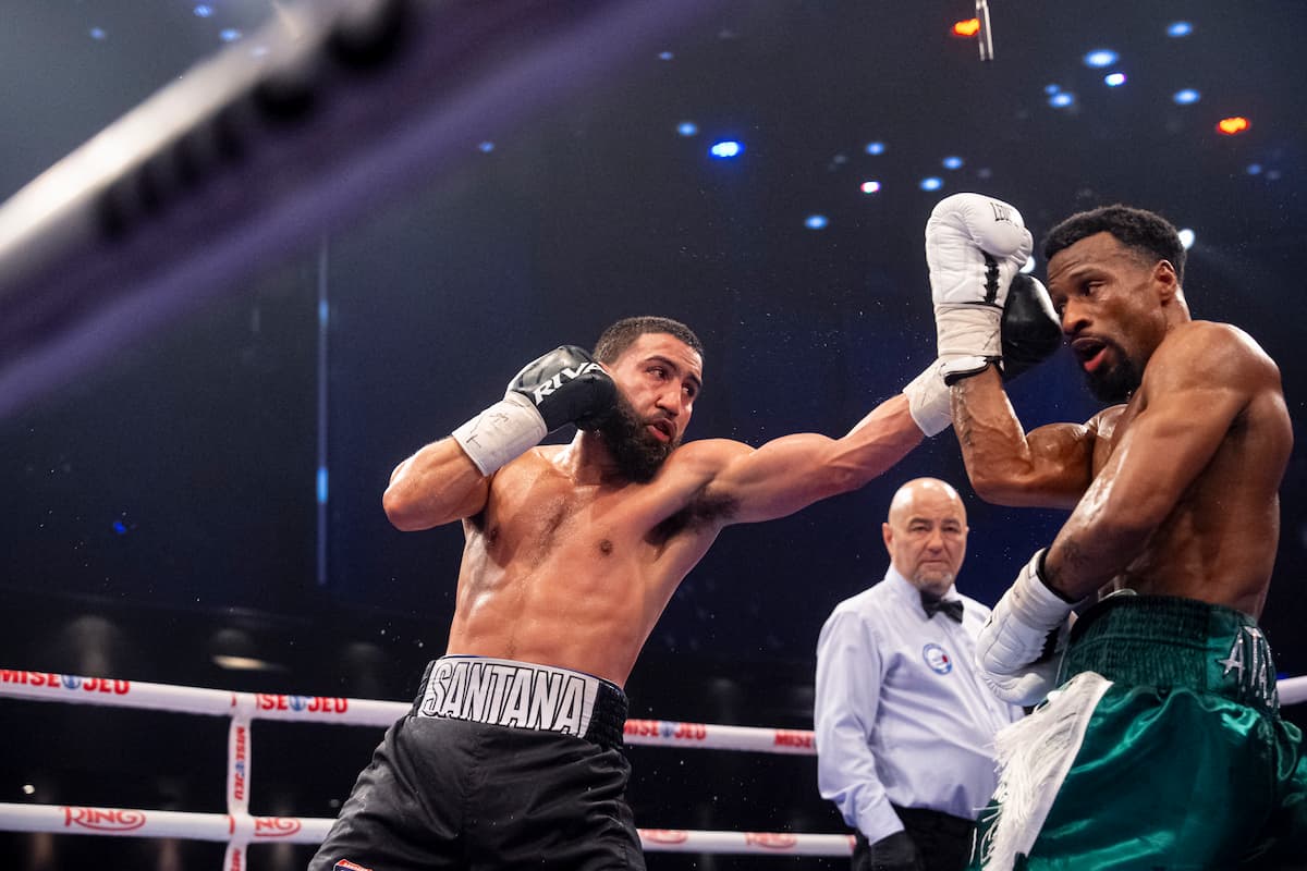 Luis Santana throws a jab during his bout against Chann Thonson
