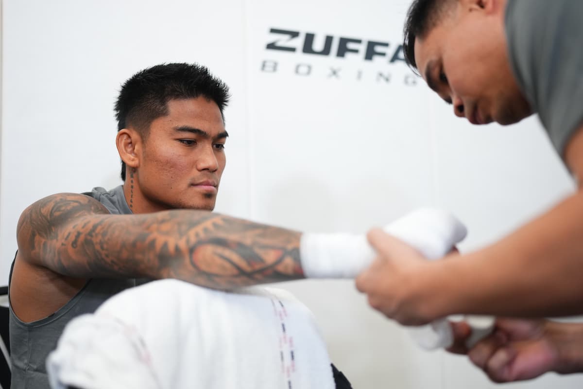 Mark Magsayo getting his hands wrapped ahead of his upcoming boxing match