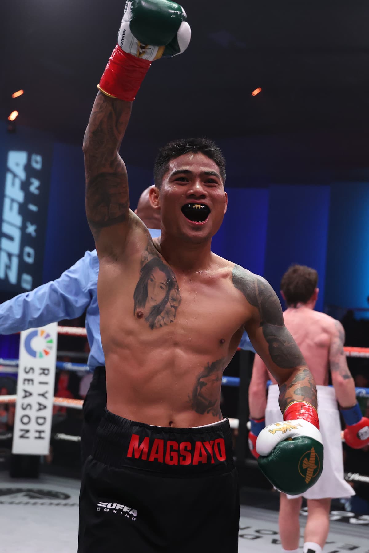 Mark Magsayo celebrates his victory over Feargal McCrory during their boxing match