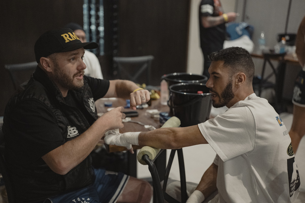 Miles Zalewski having his hands wrapped