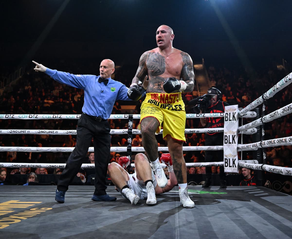 Nelson Asofa-Solomona knocks down Jarrod Wallace during their boxing match