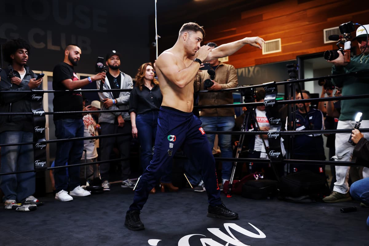 Oscar Duarte shadowboxes during a media workout