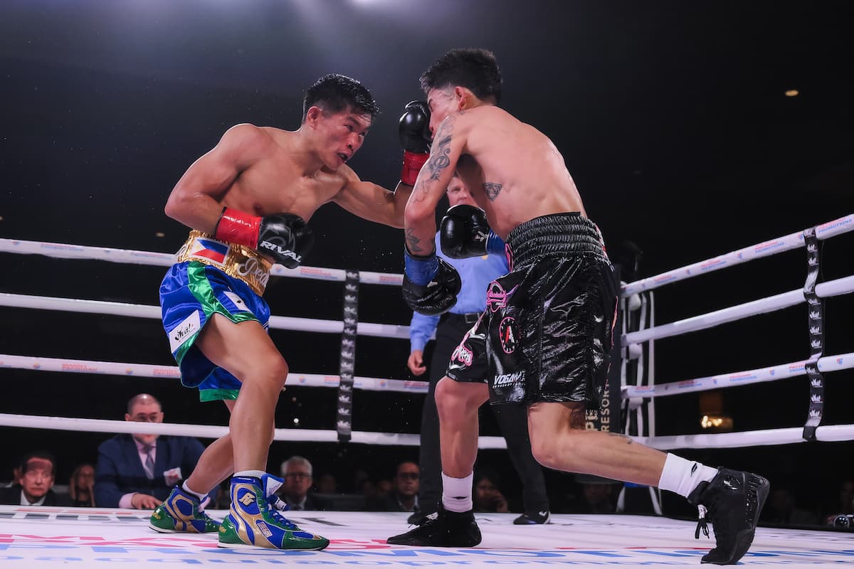 Pedro Taduran and Gustavo Perez Alvarez during their boxing match