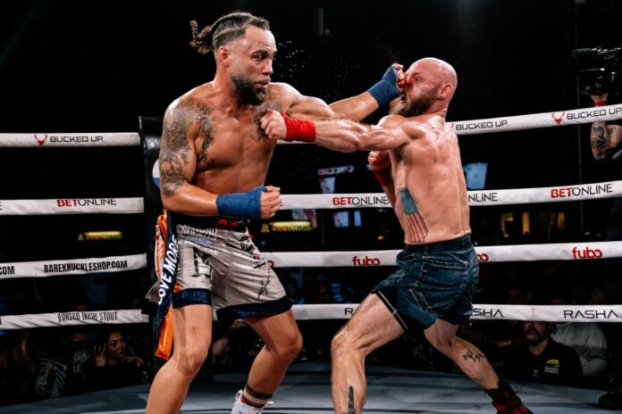 Quentin Gaskins lands a punch during his bout against Matt Guymon