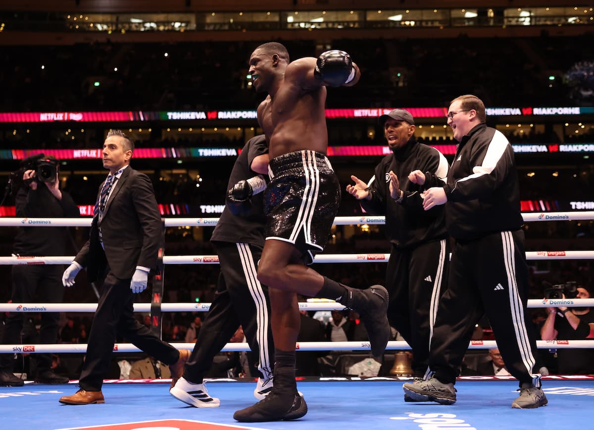 Richard Riakporhe celebrates his victory over Jeamie Tshikeva during their boxing match