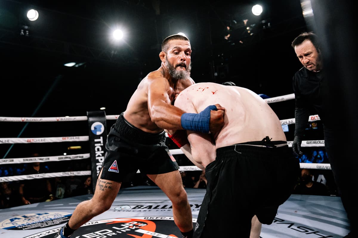Tony Murphy lands a body punch during his bout against Skyler Mauller