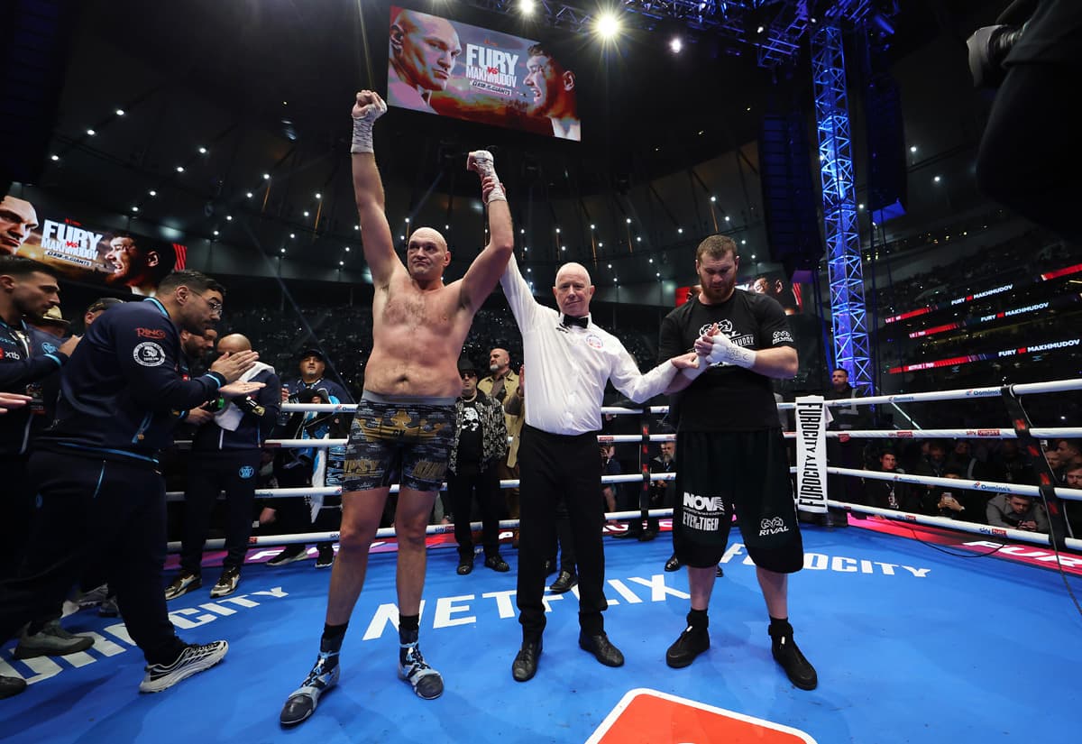 The referee raises Tyson Fury’s hand in victory over Arslanbek Makhmudov during their boxing match