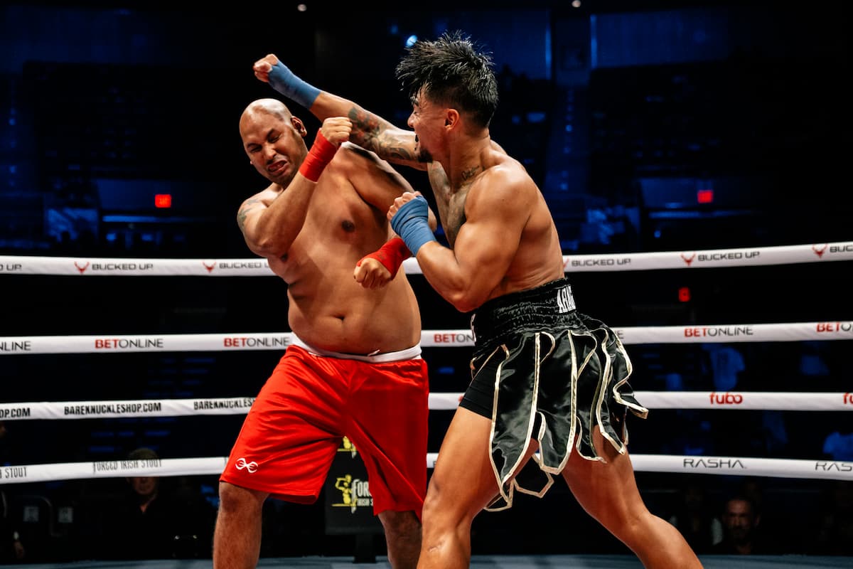 Vincent Aragona throws a punch during his bout against Simeon Crawford