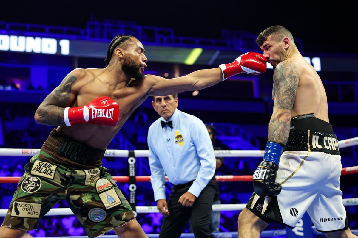 Amari Jones lands a jab during boxing bout against Vincenzo Gualtieri