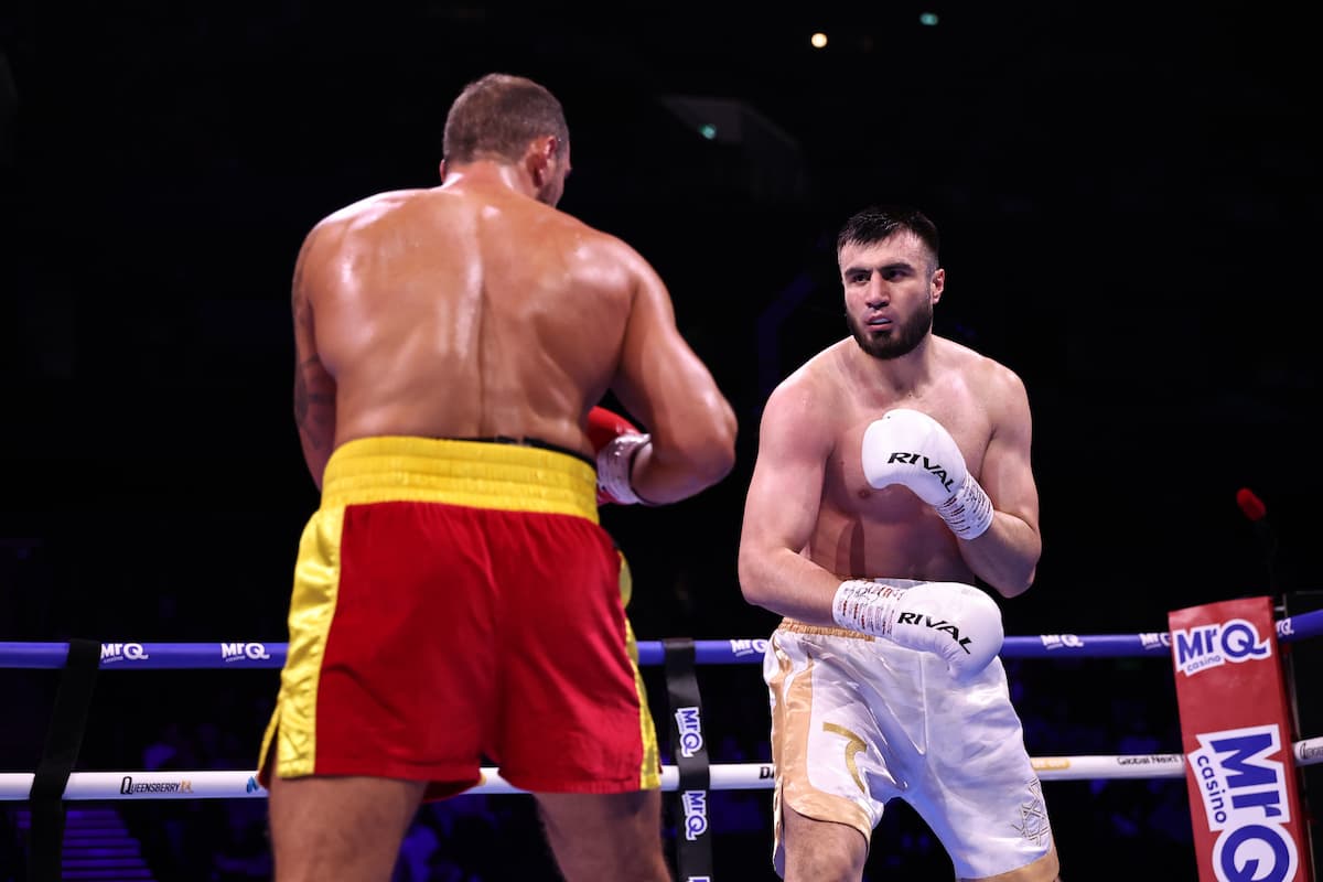 Bakhodir Jalolov during his boxing bout against Agron Smakici