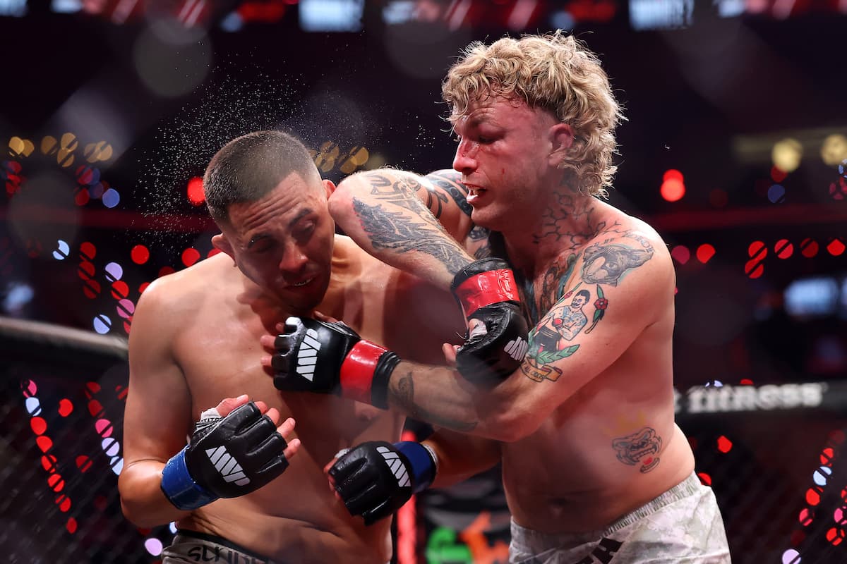 Brandon Jenkins throws an elbow strike during his bout against Chris Avila