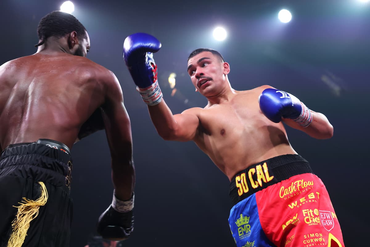 Callum Peters throws an uppercut during his bout against Joeshon James