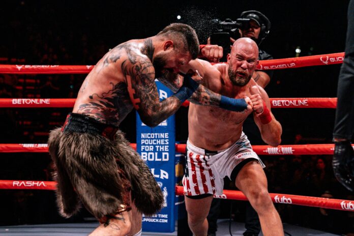 Cameron Delano throws a punch during his bout against Alex Terrible at BKFC Blood 4 Blood