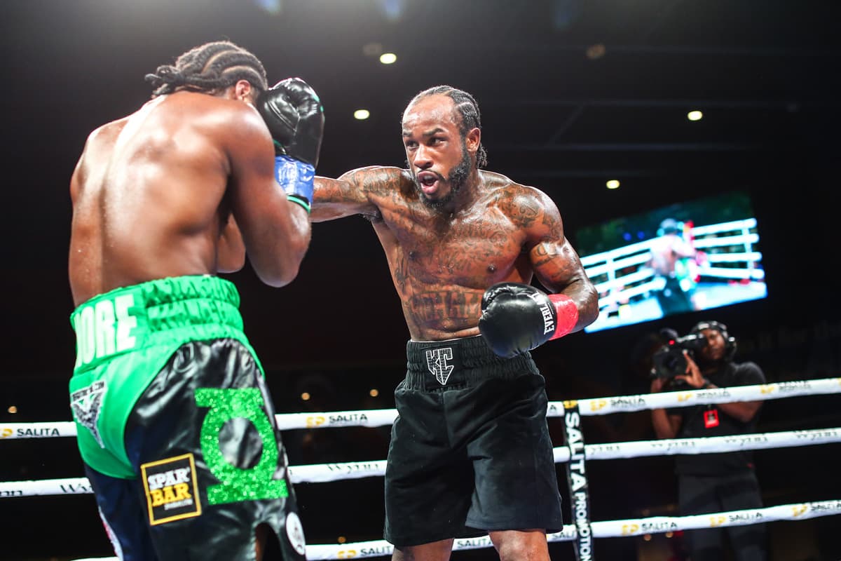 Casey Dixon lands a punch during his bout against Matthew Nore