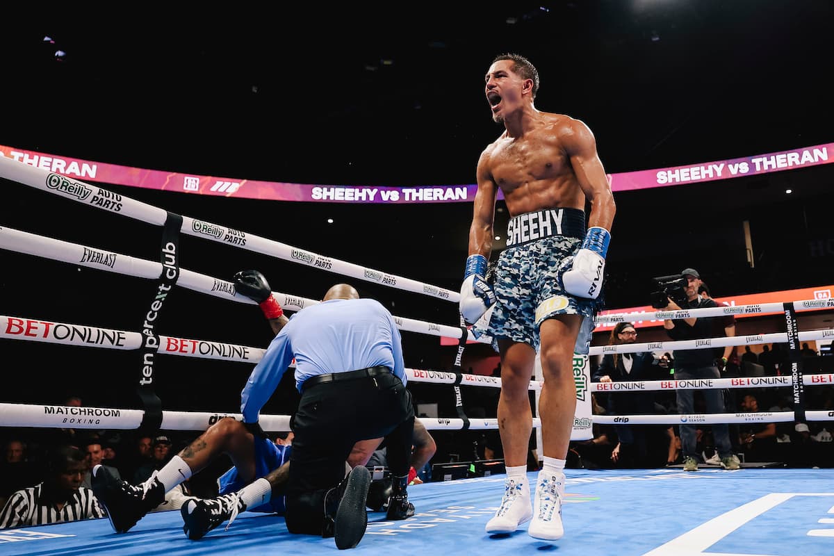Charlie Sheehy knocks down Nike Theran during their bout