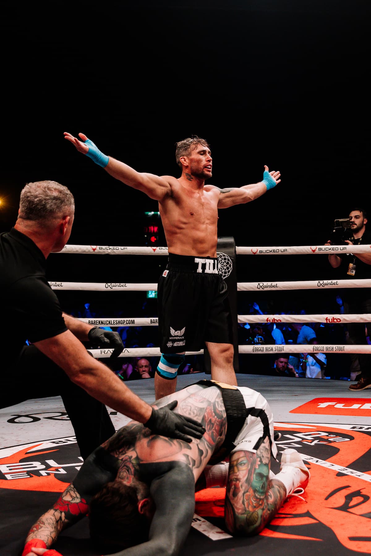 Darren Till knocks down Aaron Chalmers during their bout