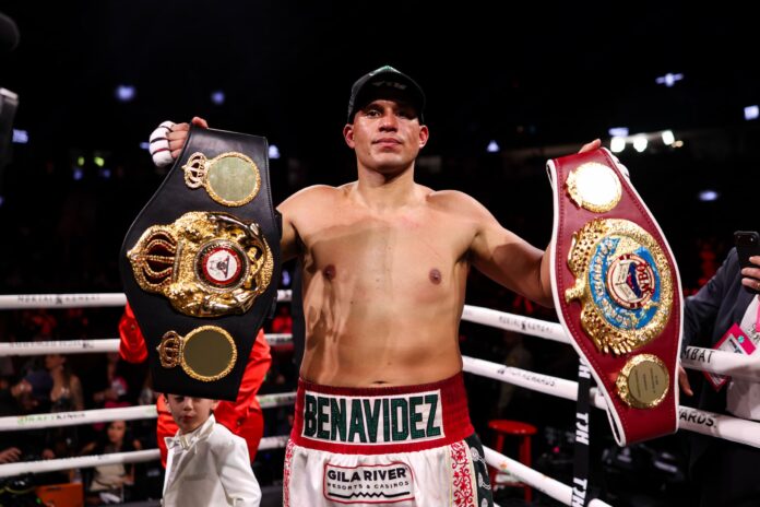 David Benavidez poses with belts after victory over Gilberto Zurdo Ramirez