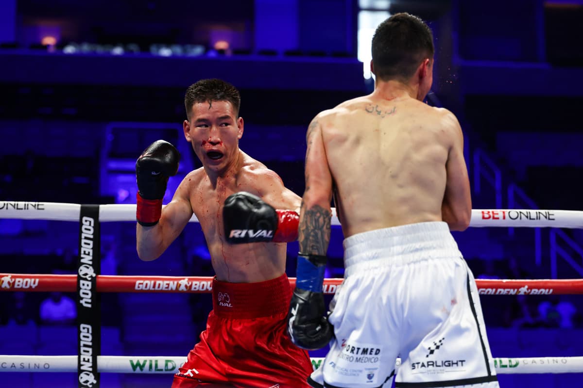 Enkhmandakh Kharkhuu during boxing bout against Adrian Herrera