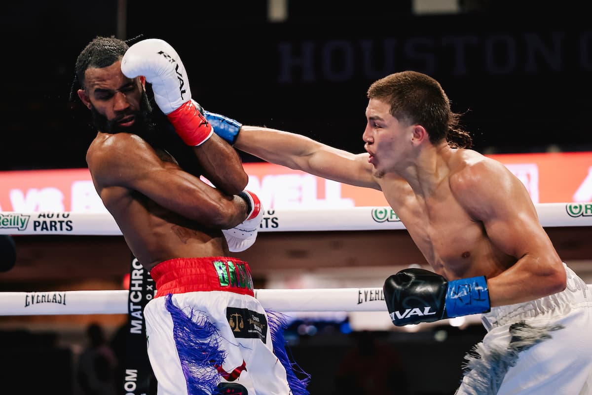 Frank Espinoza lands a punch during his bout against Bryce Blackwell