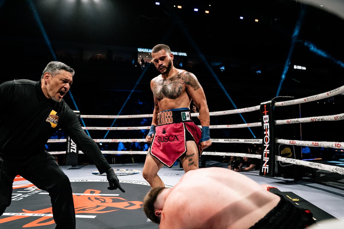 Iman Williams knocks down Cody Kerr during their bout
